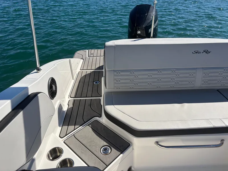 Slide: The Image of 2024 Sea Ray SPX 210 Outboard boat rear on water. - 21