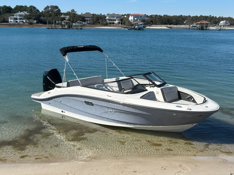 Slide: The Image of 2024 Sea Ray SPX 210 Outboard parked on the beach. - 3