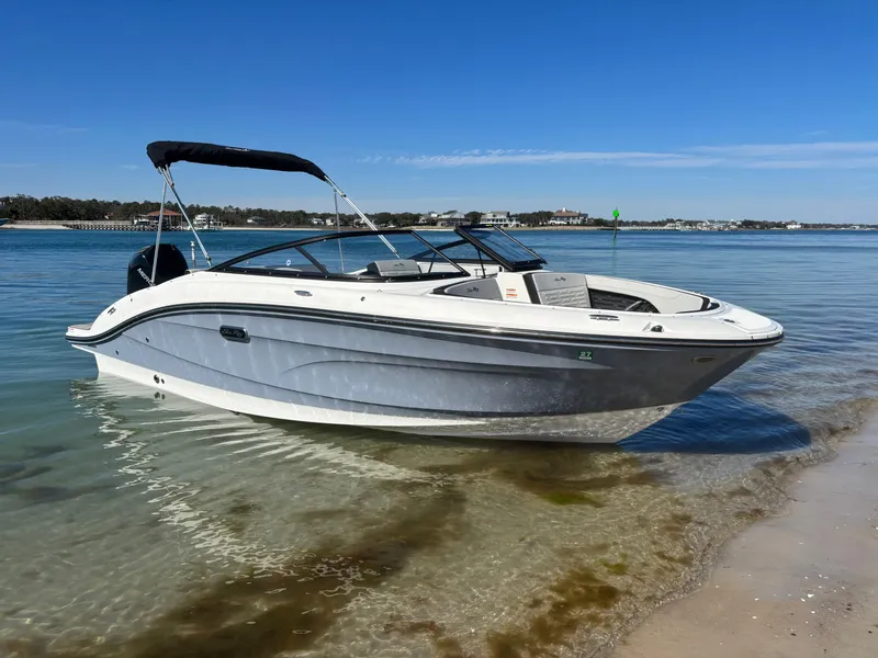 Slide: The Image of 2024 Sea Ray SPX 210 Outboard on calm water. - 44