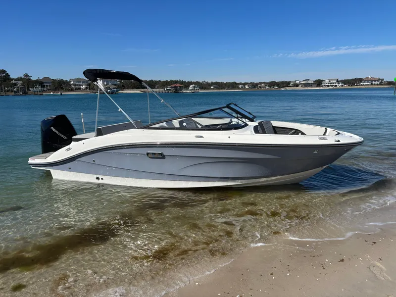 Slide: The Image of 2024 Sea Ray SPX 210 Outboard parked on the beach. - 47