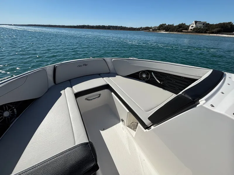 Slide: The Image of 2024 Sea Ray SPX 210 Outboard on calm waters. - 7