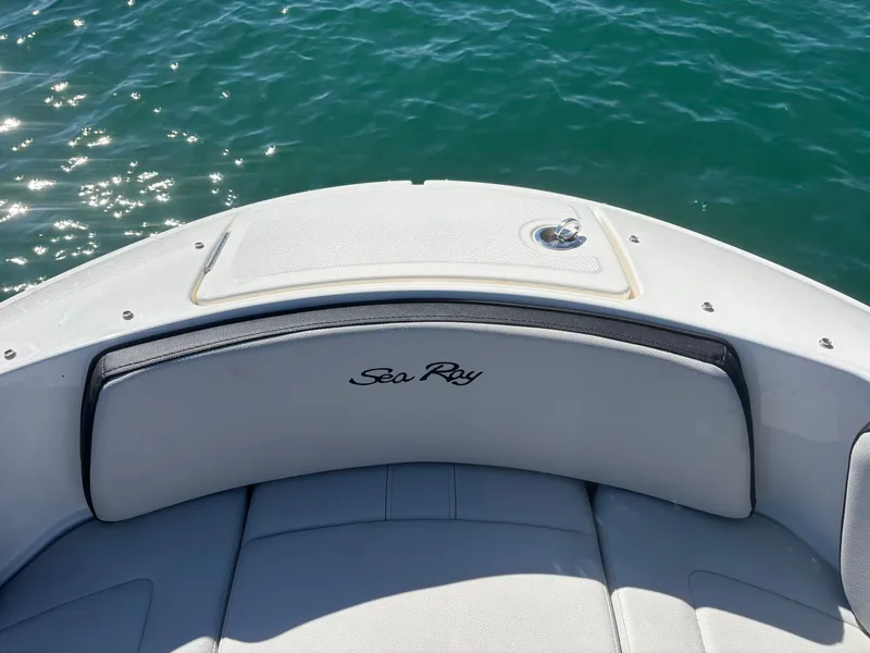 Slide: The Image of 2024 Sea Ray SPX 210 Outboard boat on water. - 8