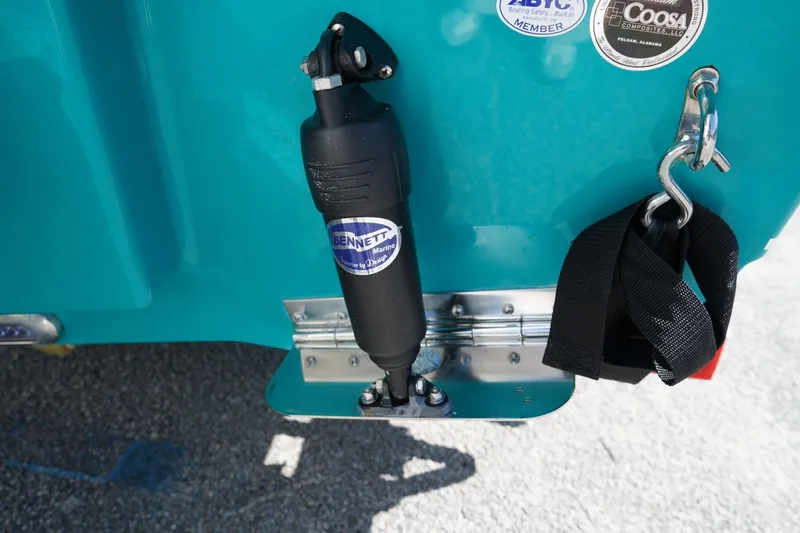 Slide: The Image of Close-up of 2021 Sea Hunt Ultra 219 boat trim tab and hardware. - 30