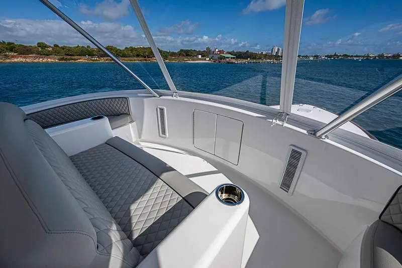 Slide: The Image of Luxurious seating area on 2026 Viking 54 Convertible yacht with ocean view. - 22
