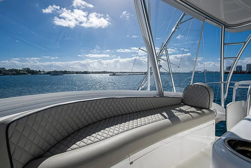 Slide: The Image of Luxurious interior of 2026 Viking 54 Convertible yacht with ocean view. - 23