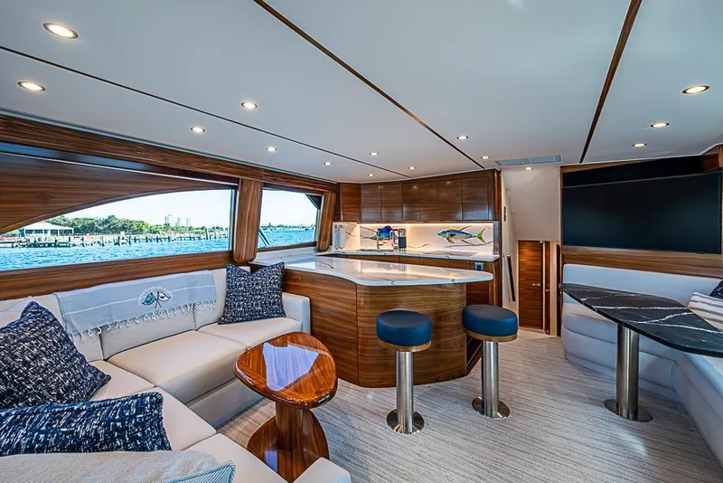 Slide: The Image of Luxurious interior of 2026 Viking 54 Convertible yacht with elegant seating and modern design. - 28
