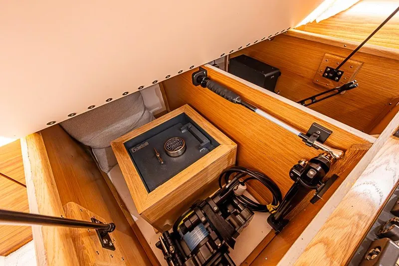 Slide: The Image of Hidden compartment in 2026 Viking 54 Convertible yacht with secure safe and equipment. - 51