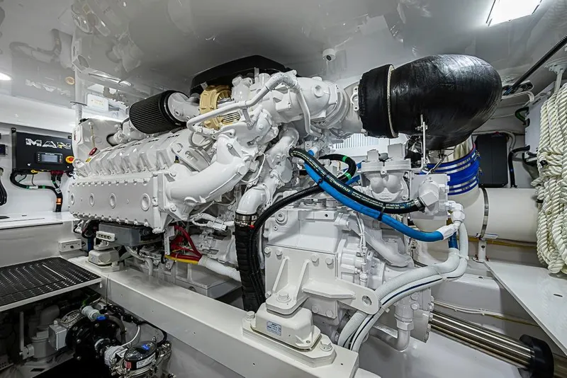 Slide: The Image of Engine room of 2026 Viking 54 Convertible yacht, showcasing advanced machinery and components. - 53