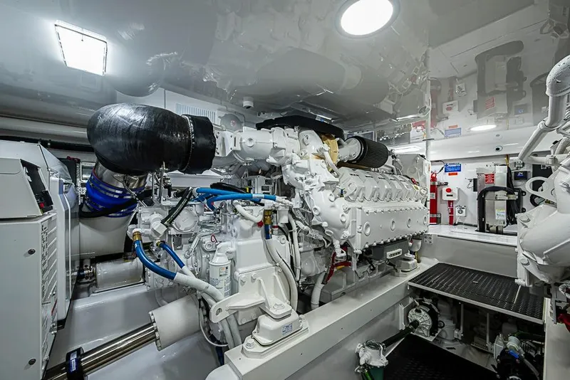 Slide: The Image of Engine room of 2026 Viking 54 Convertible yacht, showcasing advanced machinery and equipment. - 54