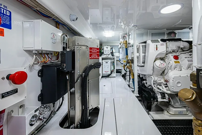 Slide: The Image of Engine room of 2026 Viking 54 Convertible yacht, showcasing advanced machinery and equipment. - 57