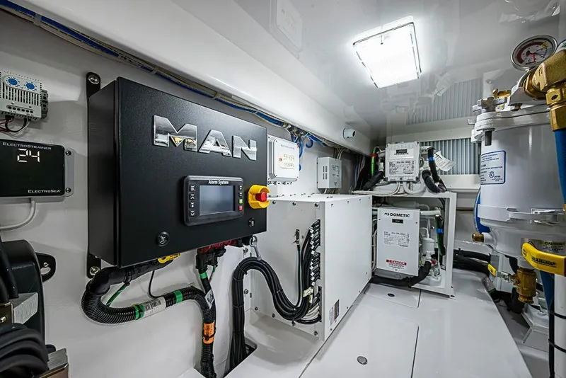 Slide: The Image of Engine room of 2026 Viking 54 Convertible yacht with MAN control system. - 58