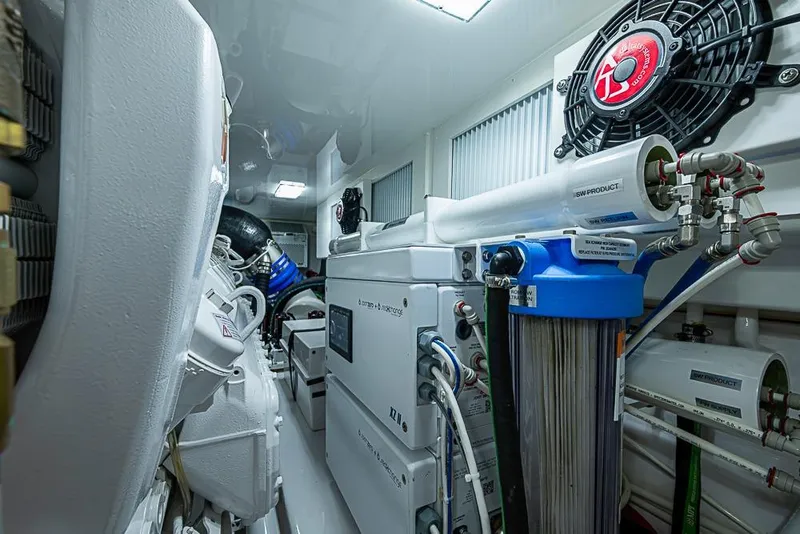 Slide: The Image of Engine room of 2026 Viking 54 Convertible yacht, showcasing advanced machinery and equipment. - 59