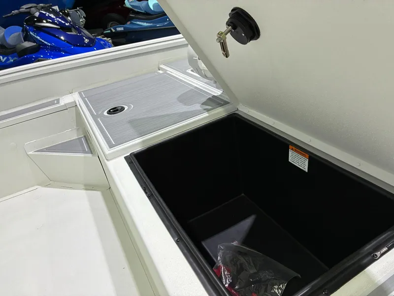 Slide: The Image of Open storage compartment in G3 Bay 20 boat, year 2026. - 11