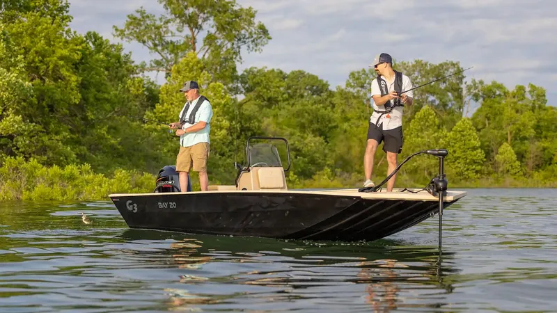 Slide: The Image of Two men fishing on a G3 Bay 20 boat, 2026 model. - 24