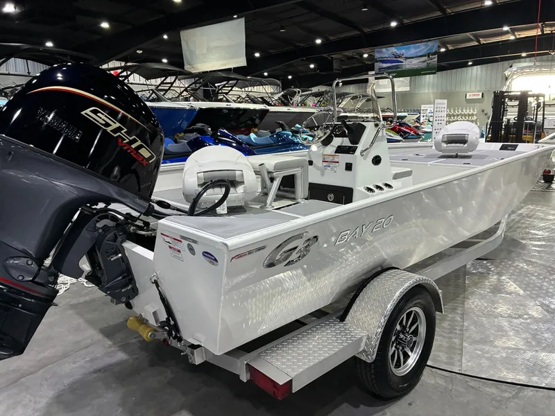 Slide: The Image of 2026 G3 Bay 20 boat in showroom with Yamaha engine. - 5