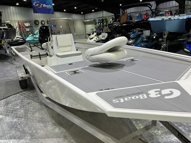 Slide: The Image of G3 Bay 20 boat 2026 in showroom with accessories. - 7