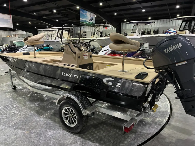 Slide: The Image of G3 Bay 17 boat 2026 with Yamaha engine in a showroom. - 3