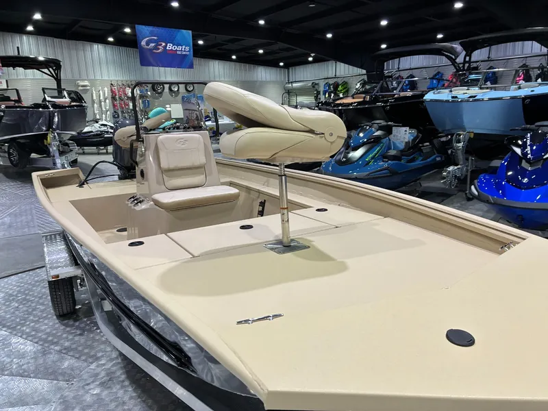 Slide: The Image of G3 Bay 17 boat 2026 in a showroom. - 7