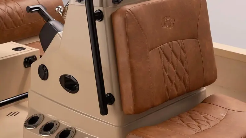 Slide: The Image of Interior of G3 Bay 21 GX boat, brown leather seats, model year 2026. - 20