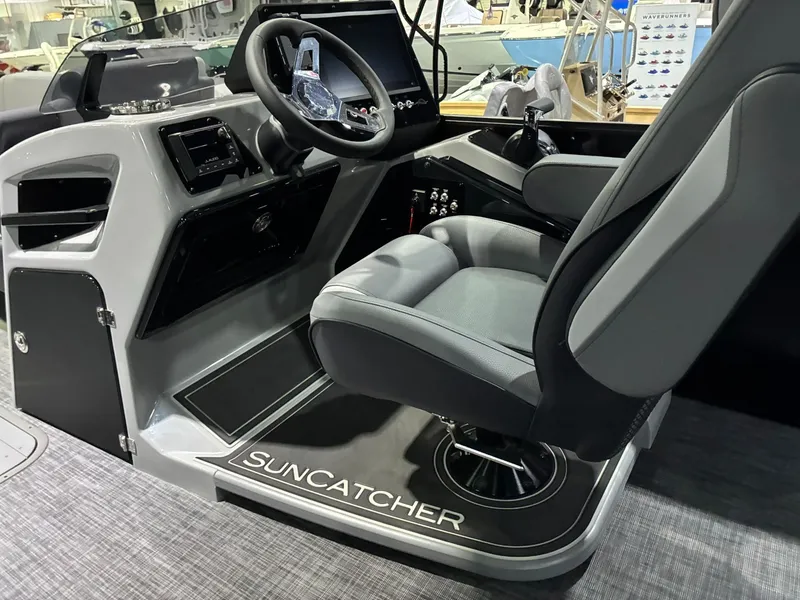 Slide: The Image of Interior of SunCatcher Elite 326 SL 2026 with helm console. - 12