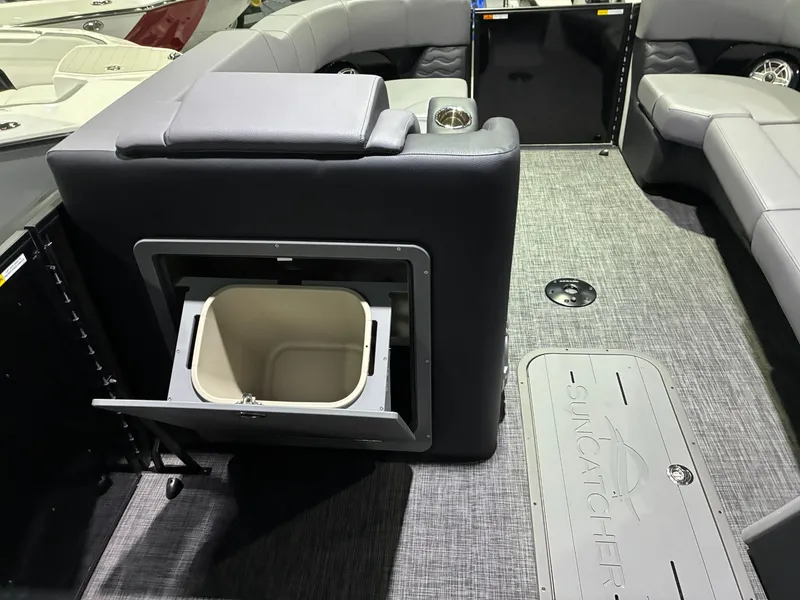Slide: The Image of Interior of 2026 SunCatcher Elite 326 SL with seating and storage area. - 14