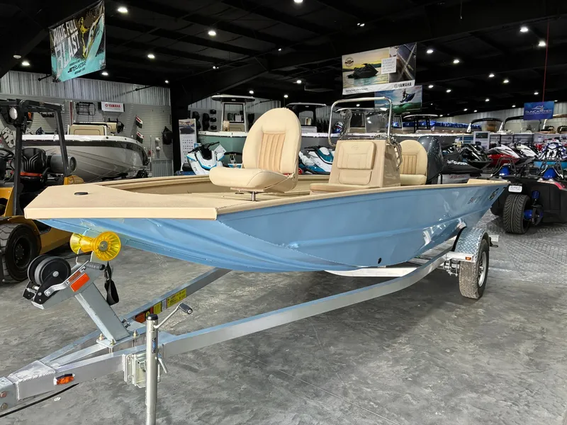 The Image of G3 Bay 17 boat 2026 in showroom on trailer. - 1