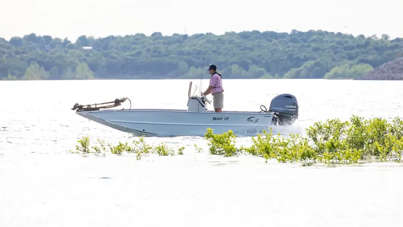 Slide: The Image of 2026 G3 Bay 17 boat on a lake with angler. - 22