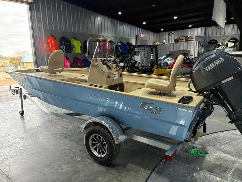 Slide: The Image of 2026 G3 Bay 17 boat with Yamaha engine in showroom. - 3