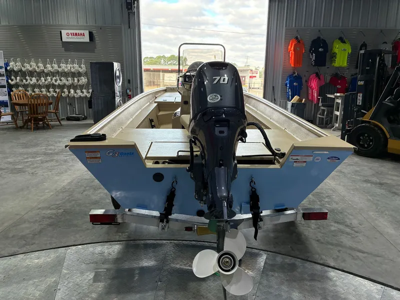 Slide: The Image of 2026 G3 Bay 17 boat with Yamaha engine in showroom. - 4