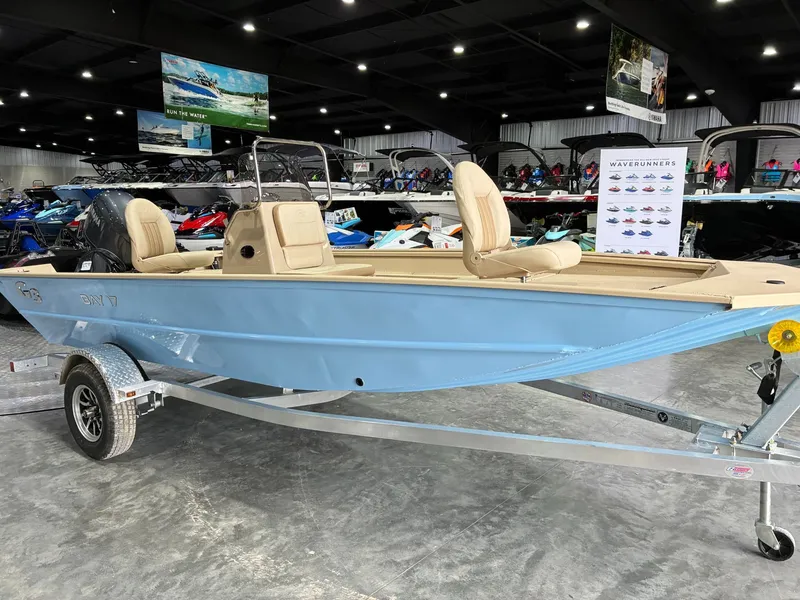 Slide: The Image of G3 Bay 17 boat 2026 displayed in a showroom. - 6