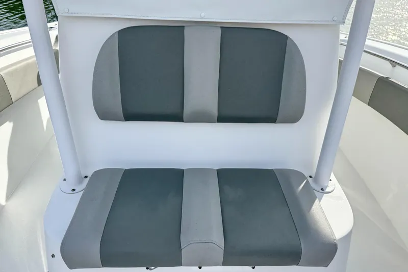 Slide: The Image of 2021 Cape Horn 31 T boat seating with gray and white cushions. - 21