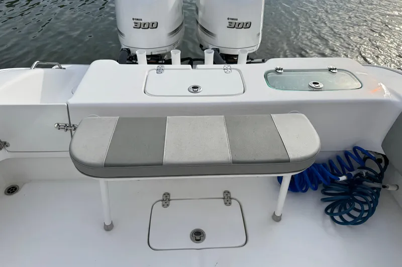 Slide: The Image of 2021 Cape Horn 31 T boat docked at marina with residential backdrop. - 7