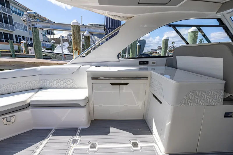 Slide: The Image of Luxurious interior of 2022 Regal LX36 boat with sleek seating and modern design. - 36