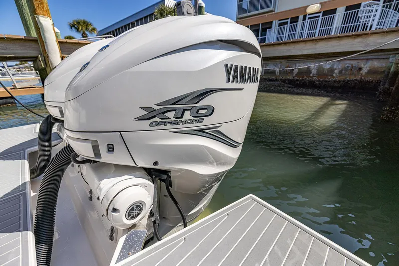 Slide: The Image of 2022 Regal LX36 with Yamaha XTO Offshore engine at dockside. - 62