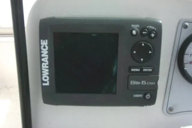 Slide: The Image of Lowrance Elite-5 DSI fishfinder on 2011 Tidewater 196 DC Explorer boat dashboard. - 14