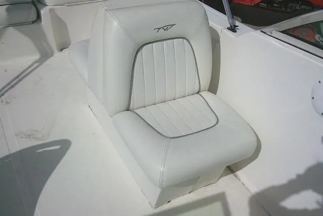 Slide: The Image of White seat on 2011 Tidewater 196 DC Explorer boat, featuring sleek design and comfortable upholstery. - 20