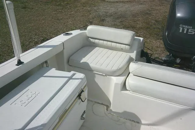 Slide: The Image of Tidewater 196 DC Explorer 2011 boat interior with seating and Yamaha 115 engine. - 24