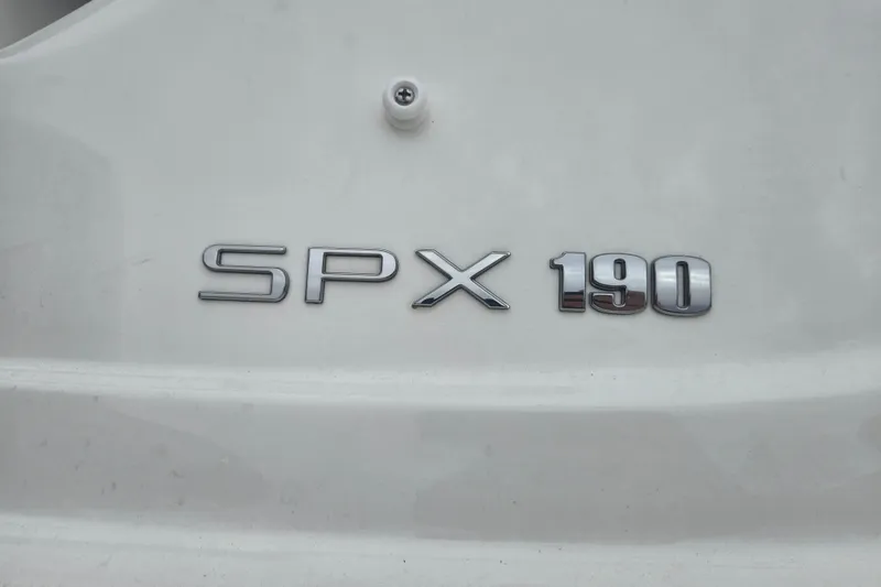 Slide: The Image of 2019 Sea Ray SPX 190 Outboard logo on white surface. - 10