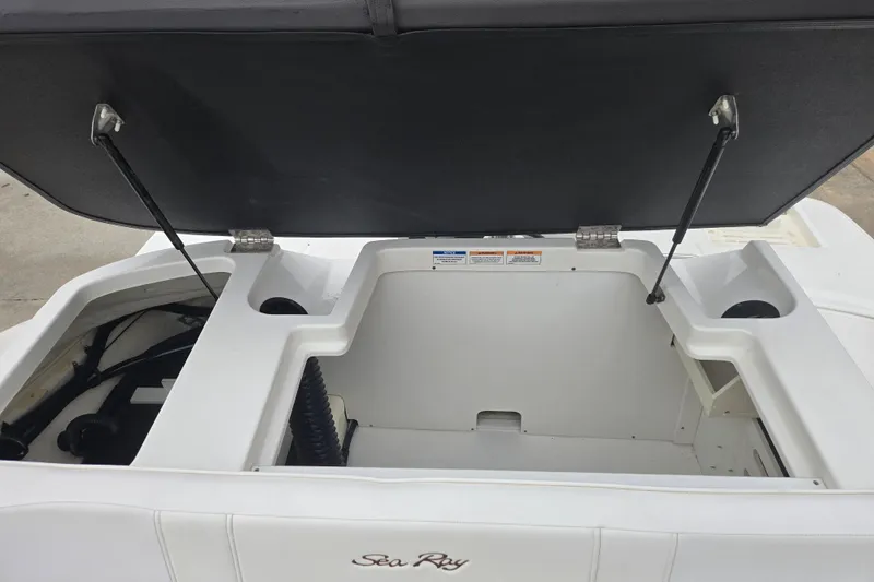 Slide: The Image of Open storage compartment of 2019 Sea Ray SPX 190 Outboard boat. - 14