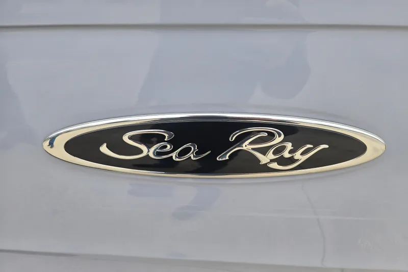 Slide: The Image of Sea Ray logo on 2019 SPX 190 Outboard boat, silver and black design. - 8