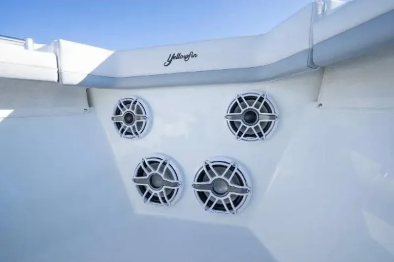 Slide: The Image of 2019 Yellowfin 39 Offshore boat with four Mercury 350 engines cruising on open water. - 13