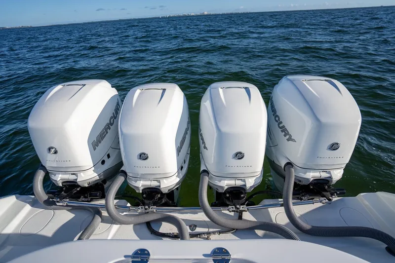 Slide: The Image of 2019 Yellowfin 39 Offshore boat with four Mercury outboard engines on open water. - 36