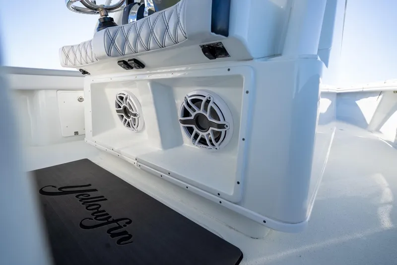 Slide: The Image of 2019 Yellowfin 39 Offshore boat interior with speakers and branded mat. - 41