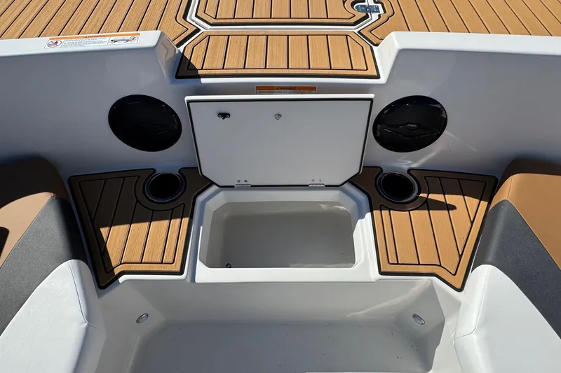 Slide: The Image of 2026 Starcraft SVX 171 OB boat interior with speakers and storage compartment. - 15