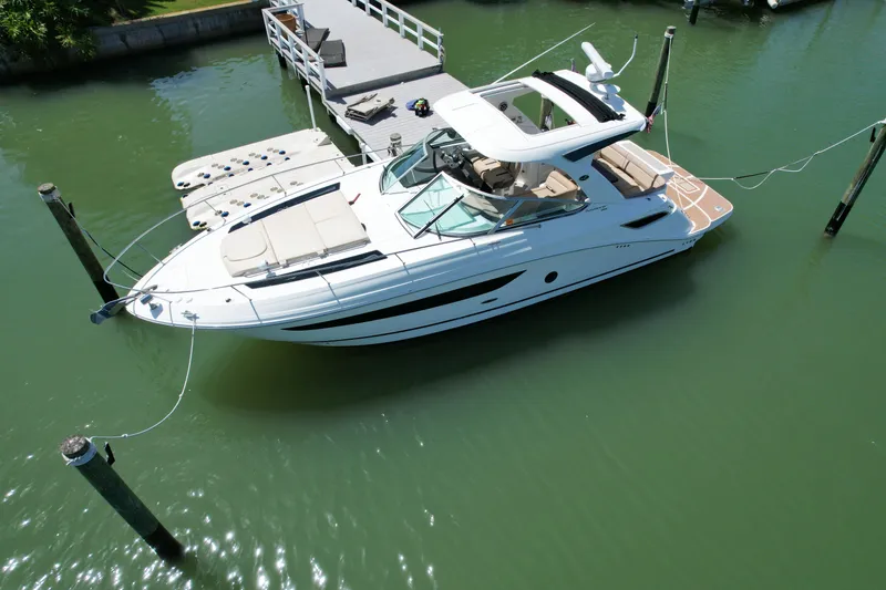 Slide: The Image of 2016 Sea Ray Sundancer 350 docked at a pier. - 15
