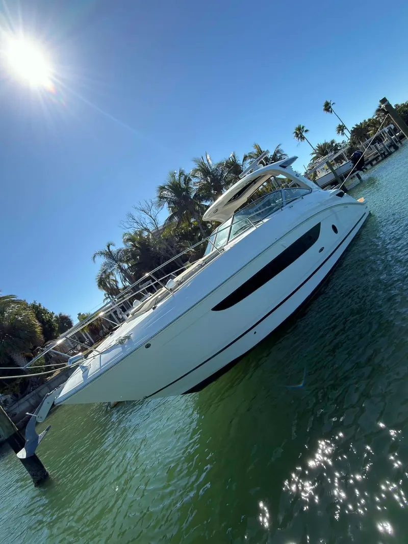 Slide: The Image of 2016 Sea Ray Sundancer 350 yacht in sunny harbor. - 17