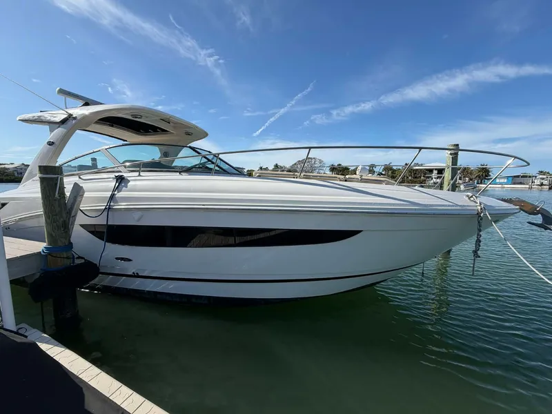 Slide: The Image of 2016 Sea Ray Sundancer 350 docked on a sunny day. - 18