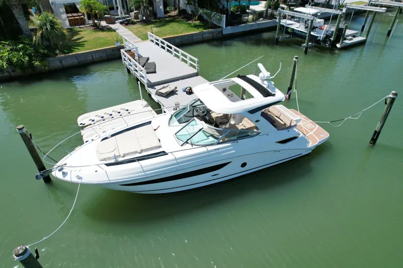 Slide: The Image of 2016 Sea Ray Sundancer 350 yacht docked in marina. - 19