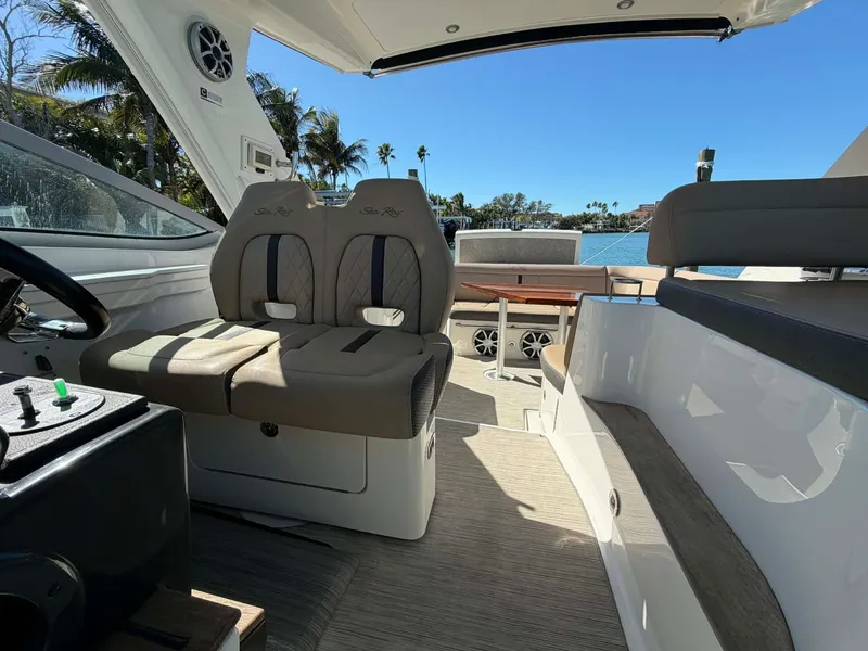 Slide: The Image of Interior of a 2016 Sea Ray Sundancer 350 yacht with seating area. - 22