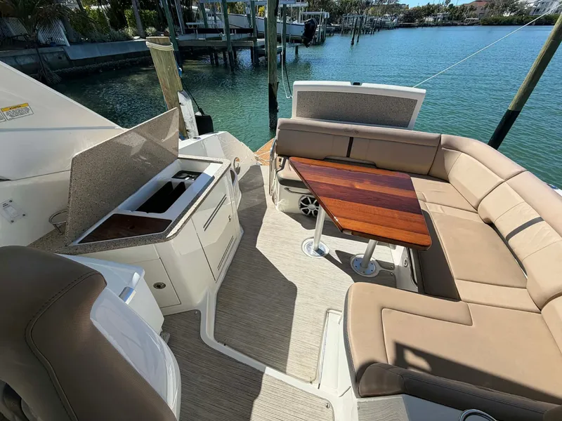 Slide: The Image of Interior of a 2016 Sea Ray Sundancer 350 yacht with seating area. - 37
